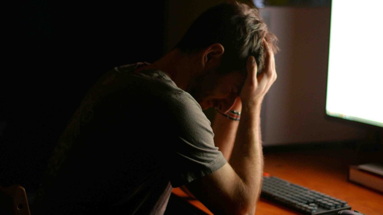 Person experiencing emotional distress from BFRBs like hair pulling or skin picking