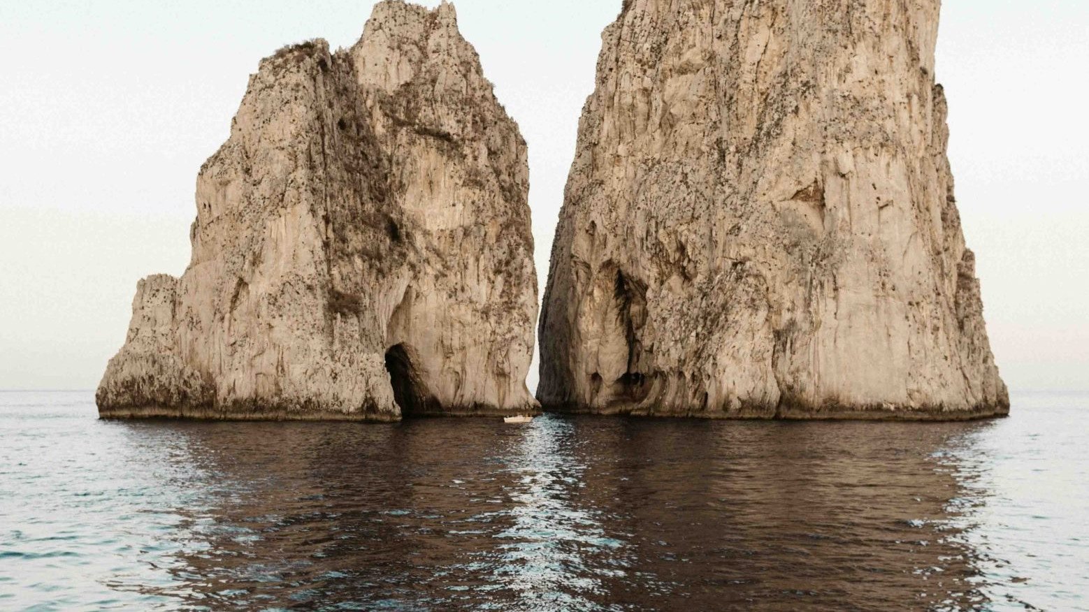 Two large rock formations separated by a narrow channel, symbolizing challenge and gradual exposure in ERP therapy